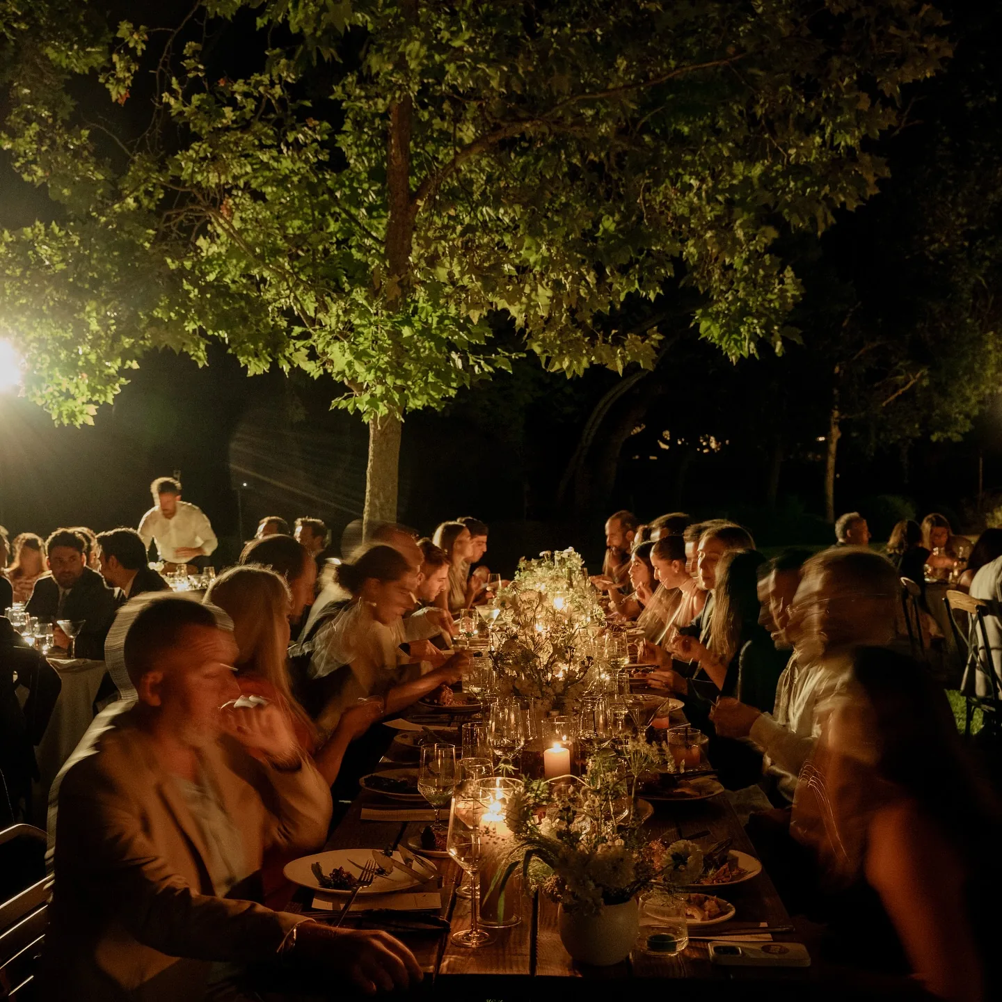 Candlelit al fresco dinner at dusk