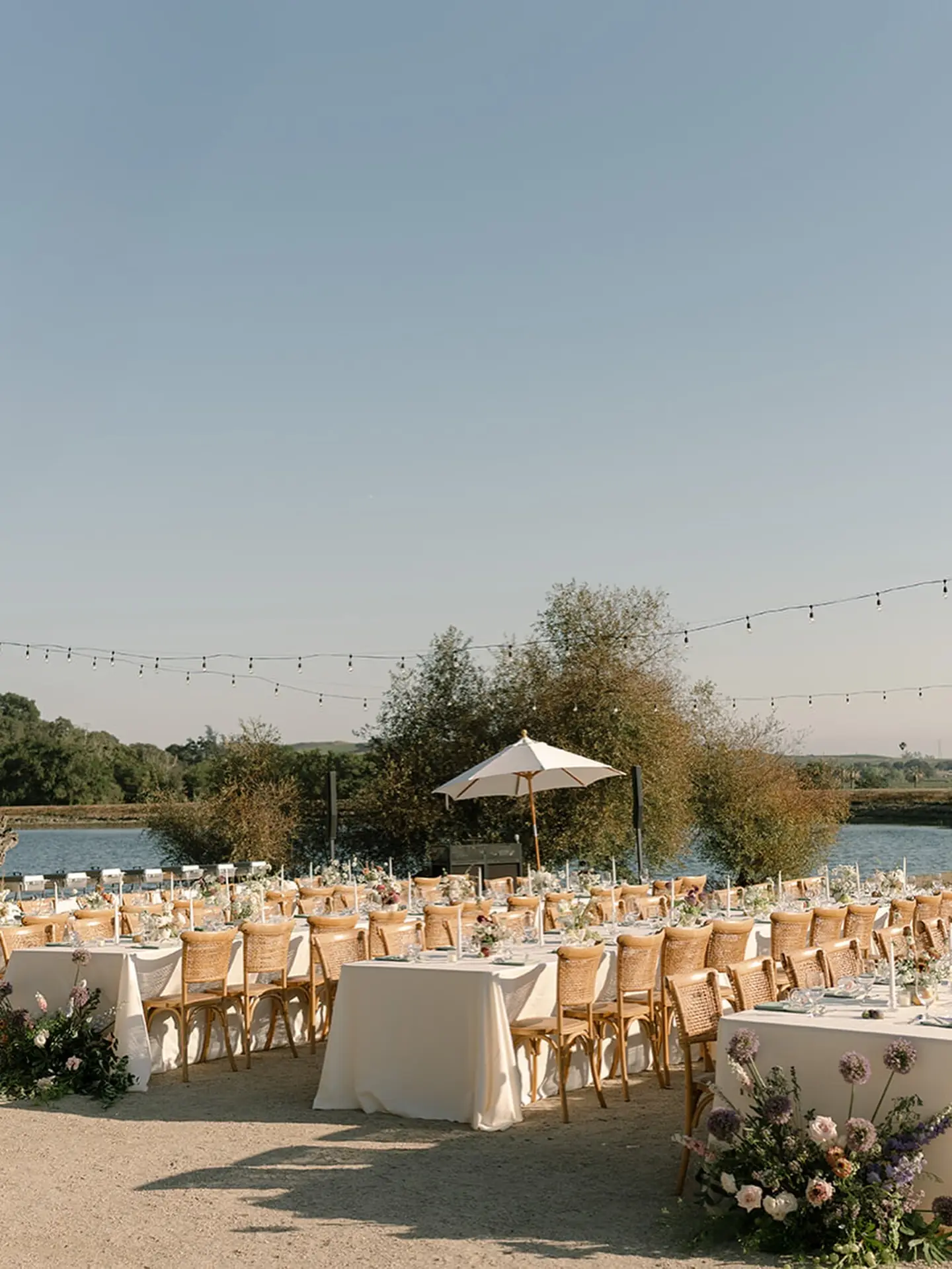 Banquet tables set beside the pond at Gundlach Bundschu