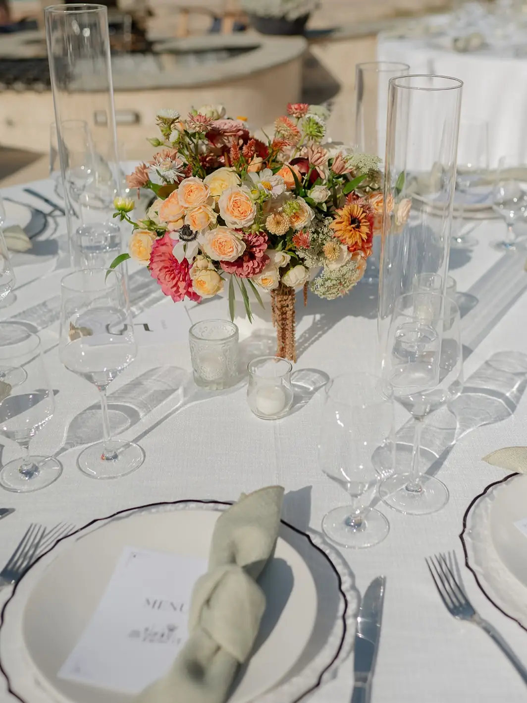 A floral centerpiece and place setting at Lavender Oak Vineyard