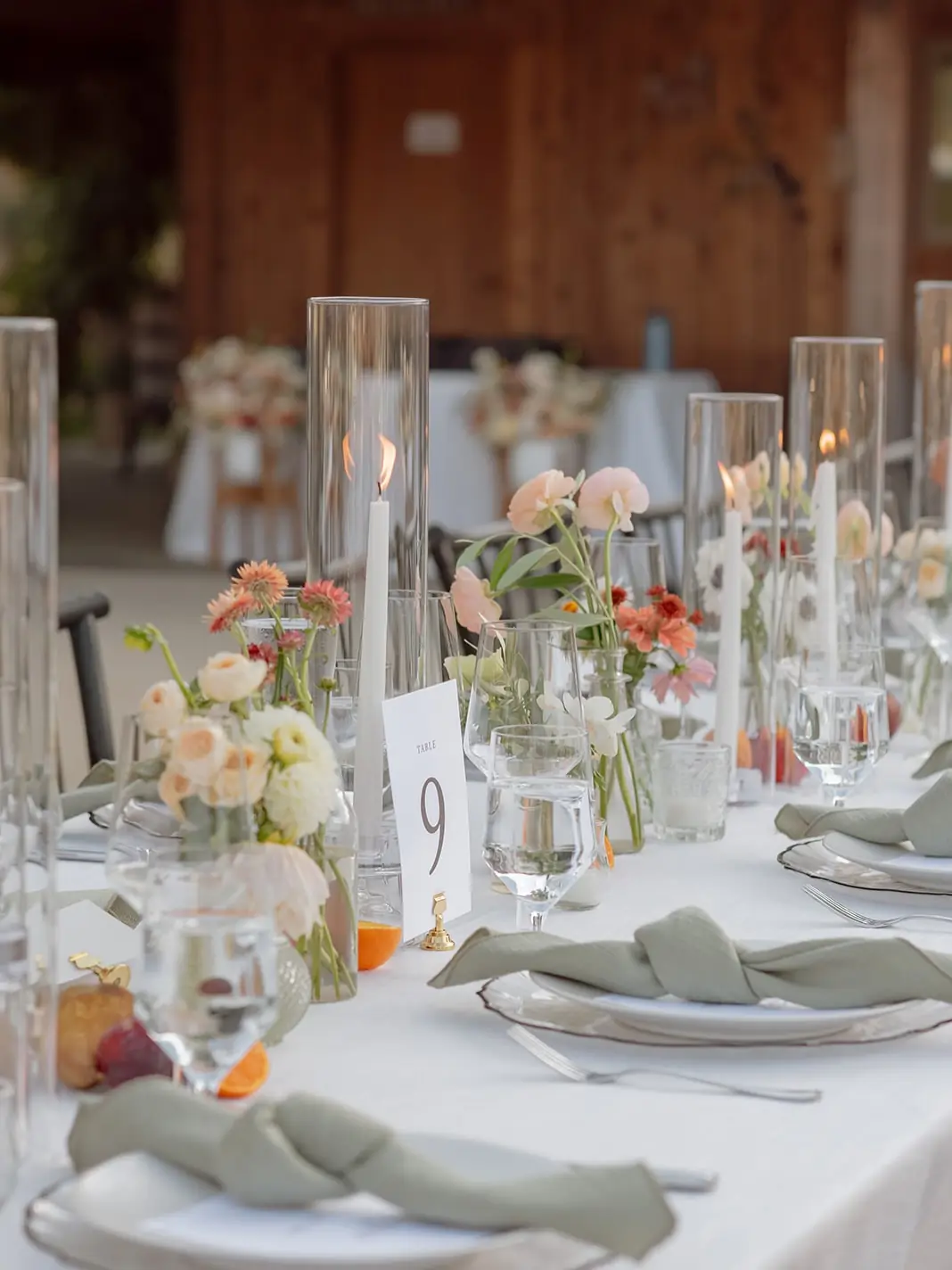 Candlelit tables inside the barn at Lavender Oak Vineyard