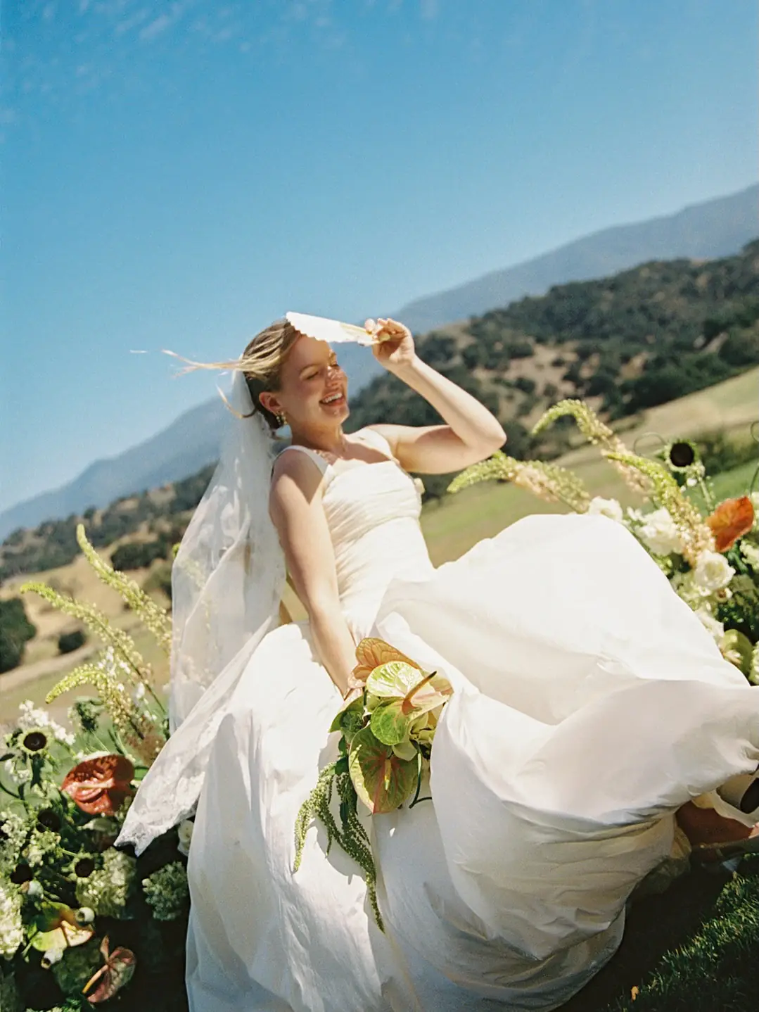 A bride among the florals and hills at Piocho Ranch