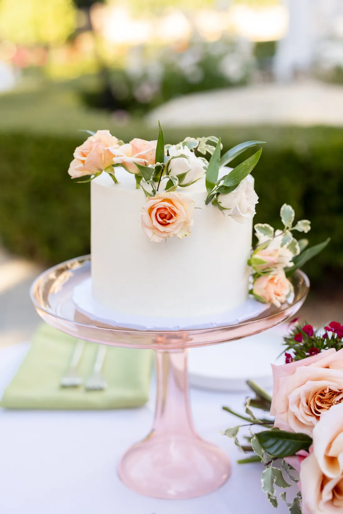 Tiered wedding cake with garden roses