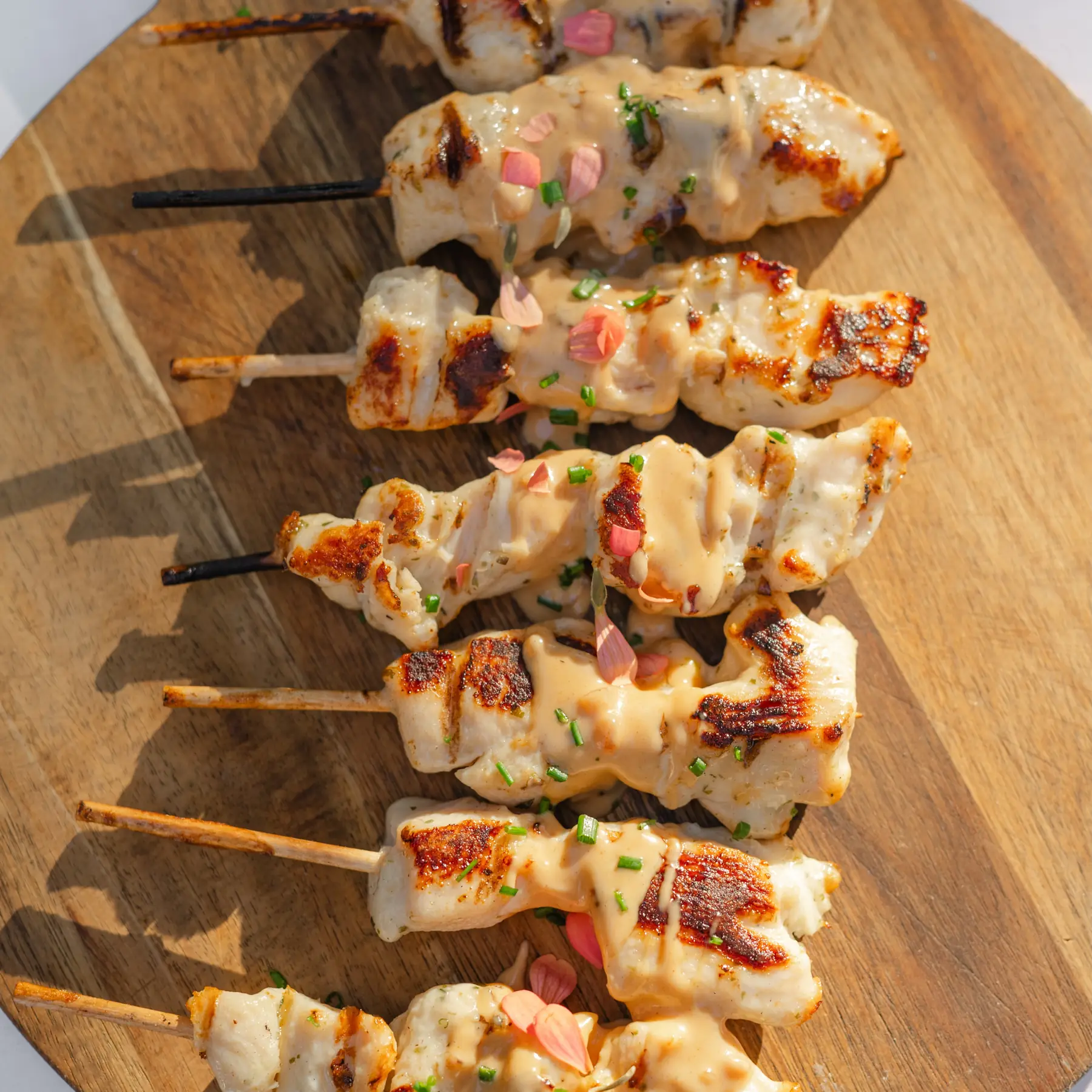 Grilled skewers finished with herbs and edible flowers at Zaca Lake